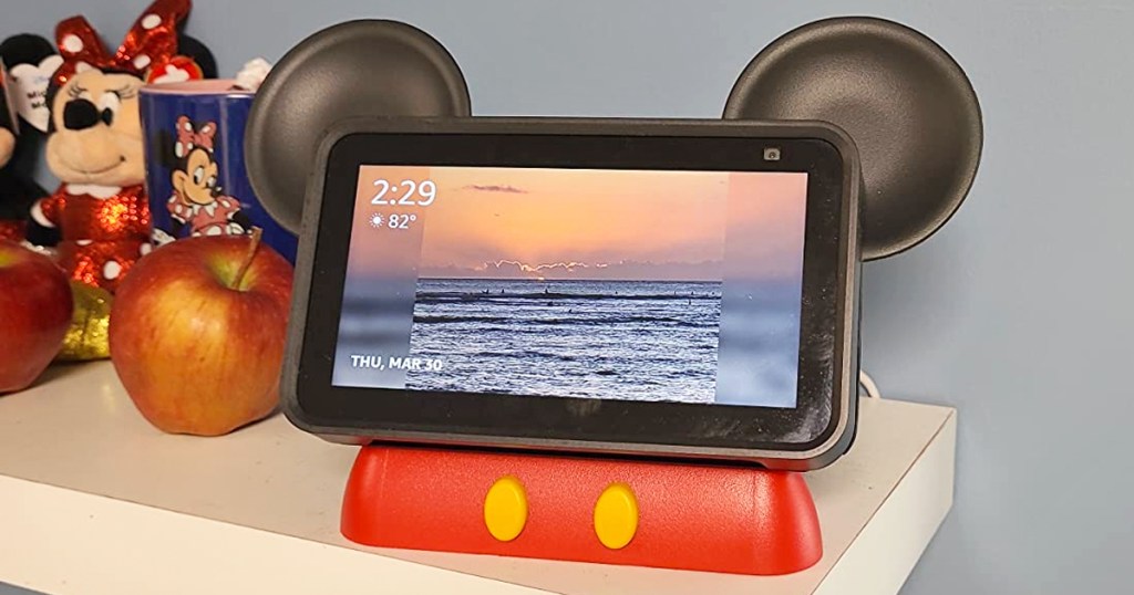 echo show device in a black and red mickey mouse stand