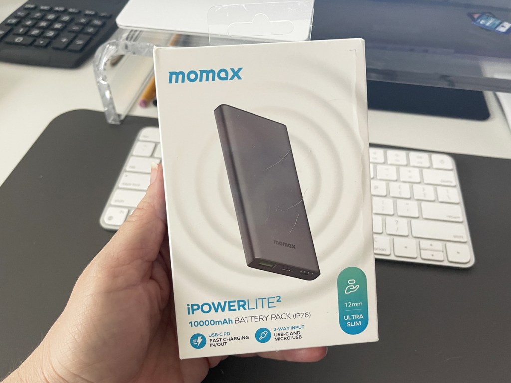 hand holding box for Momax Ultra Slim Portable Charger