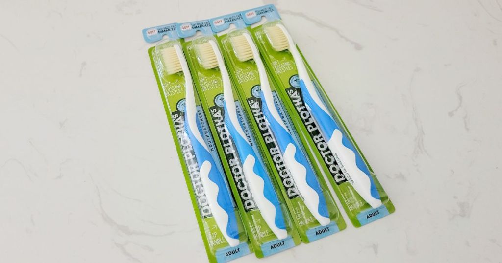 four packs of Mouthwatchers Dr Plotkas Extra Soft Flossing Toothbrushes