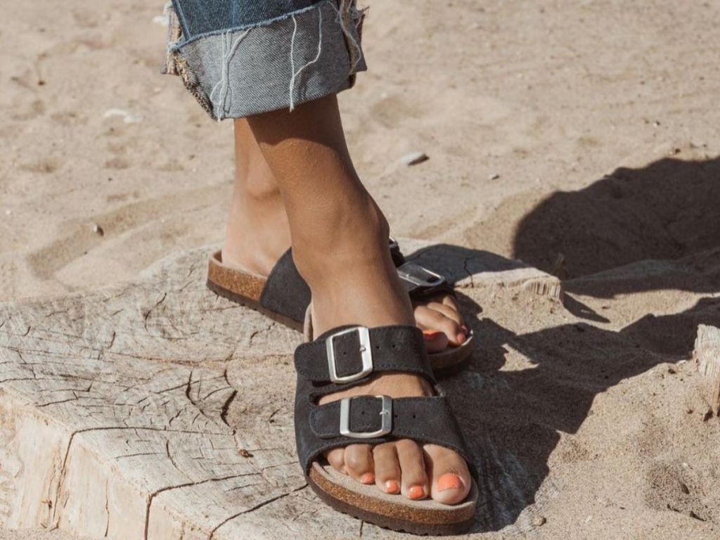 Close up of feet wearing Muk Luks Marla Sandals