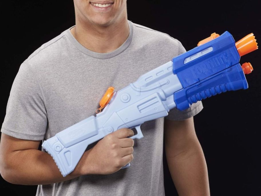 Teen holding a Nerf Fortnite Water Blaster