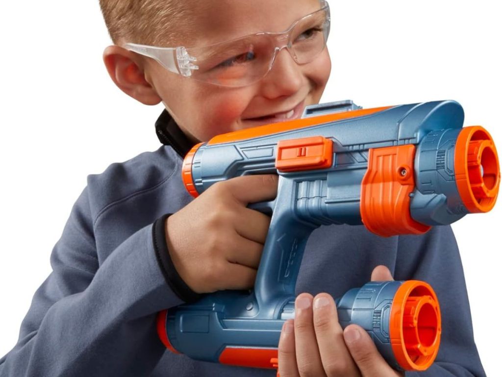 Kid using a Nerf Marvel Quad Blaster