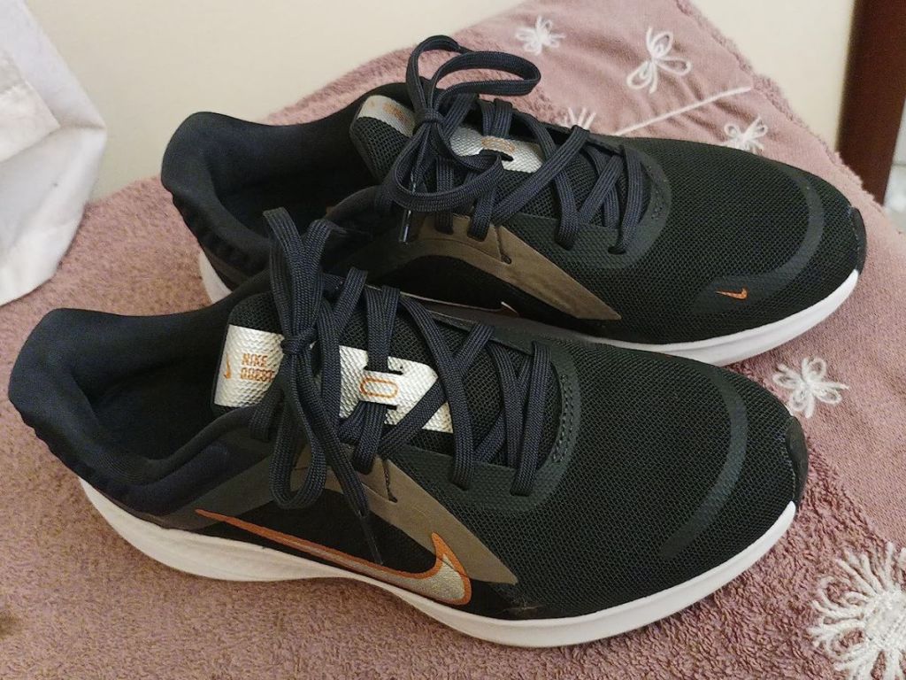 A pair of Nike Women's Quest 5 Road Running Sneakers