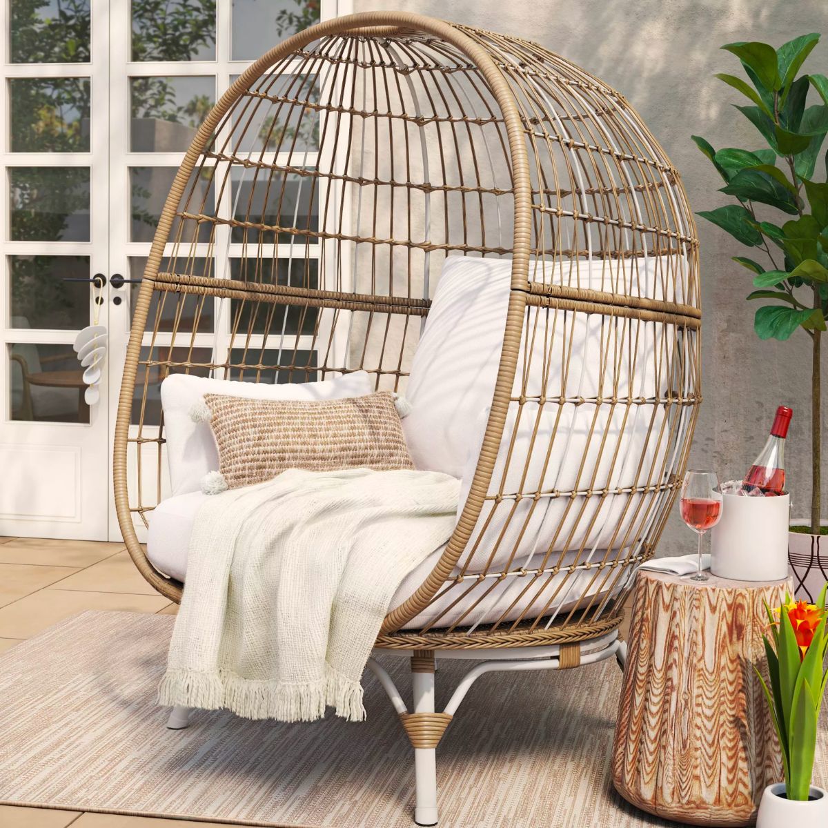 Opel House Southport Patio Egg Chair with natural colored cushion