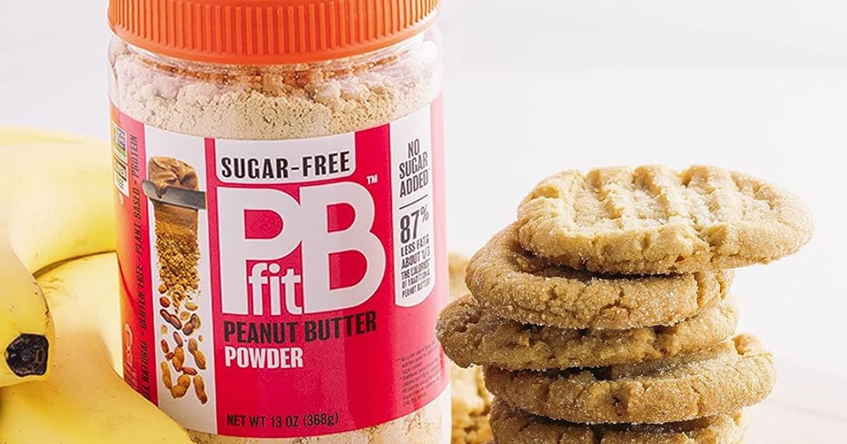 PB-Fit Sugar Free Powder next to a stack of Peanut butter cookies