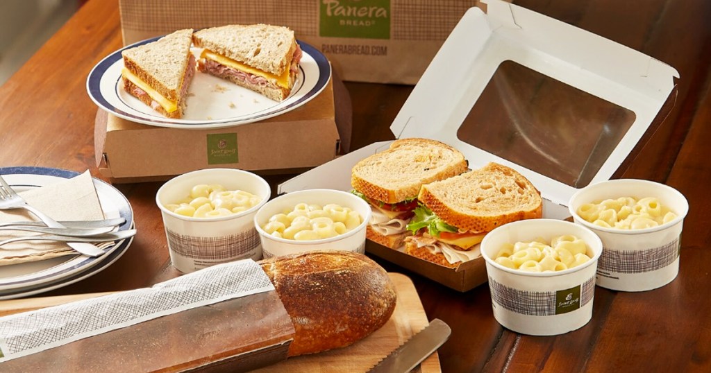 panera sandwiches and cups of mac & cheese on table