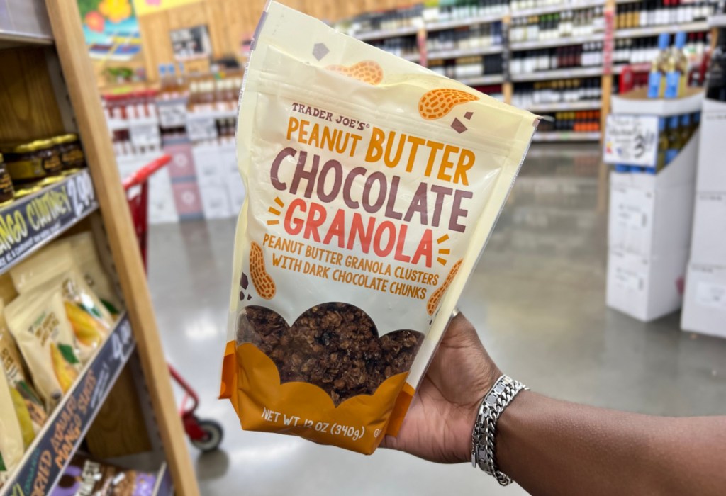 Hand Holding Peanut Butter Chocolate Granola from Trader Joes Fall Items