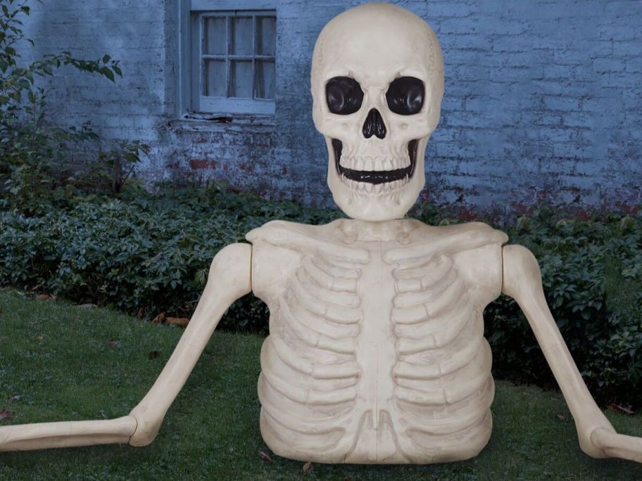 Place & Time 5ft Halloween White Ground Breaking Skeleton in lawn