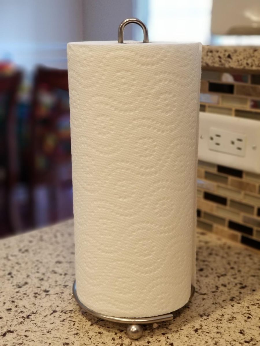 One roll of paper towels on a counter
