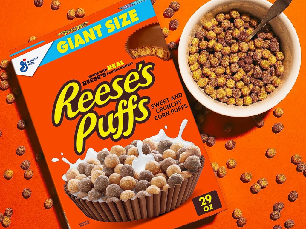 box of reese's puffs cereal next to bowl of cereal