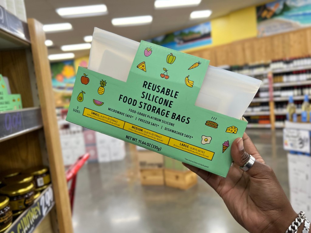 Hand holding Reusable Silicon Bags from Trader Joe's