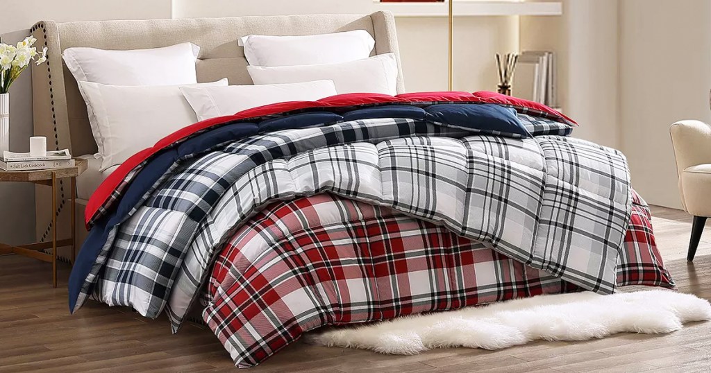 multiple plaid comforters on a bed