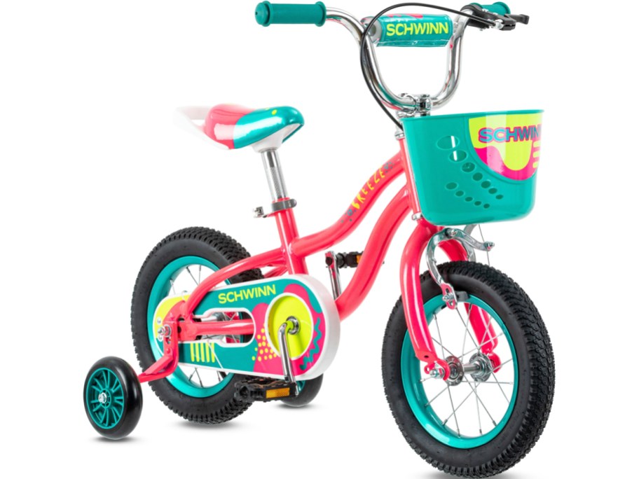 pink and teal kids bike with training wheels and basket on the front