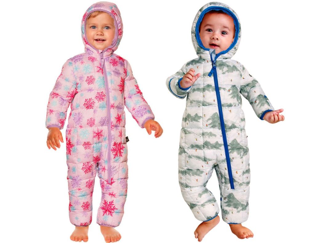 two babies wearing Spyder Baby 1-piece Snowsuits in pink and blue
