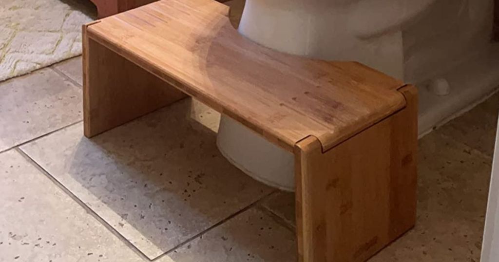 Bamboo Squatty Potty in front of a toilet 