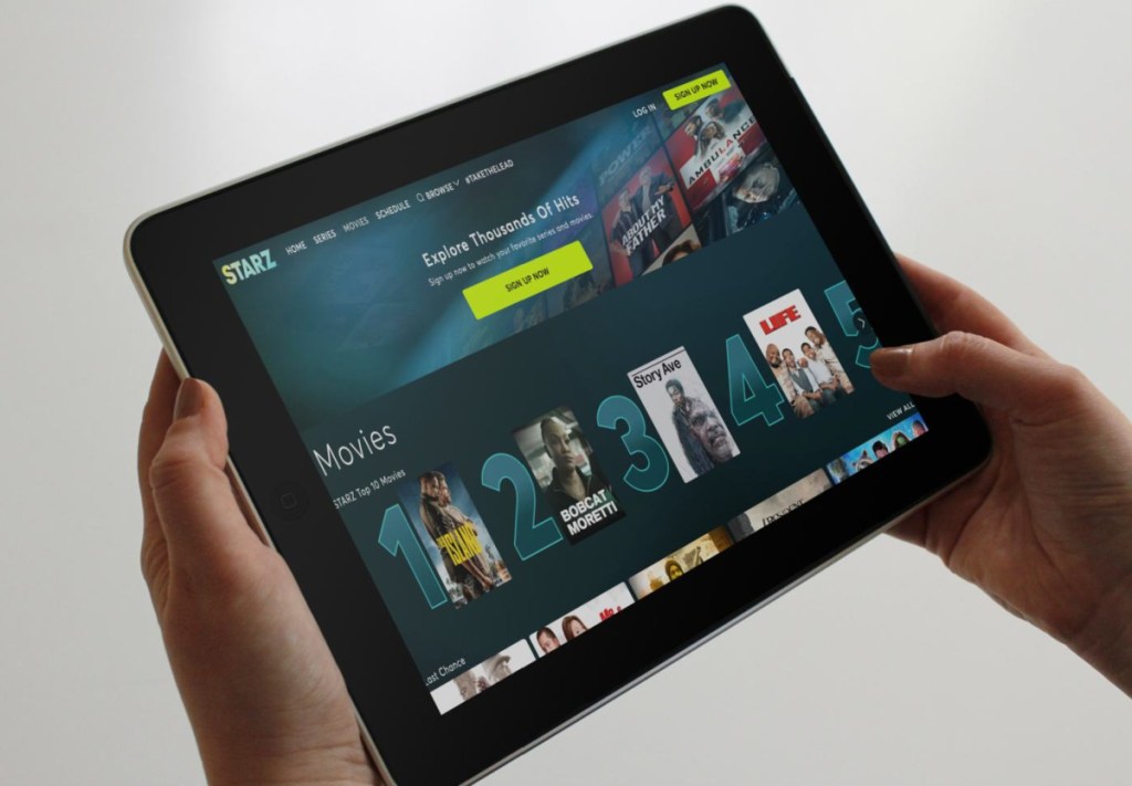 The Starz website shown on a tablet