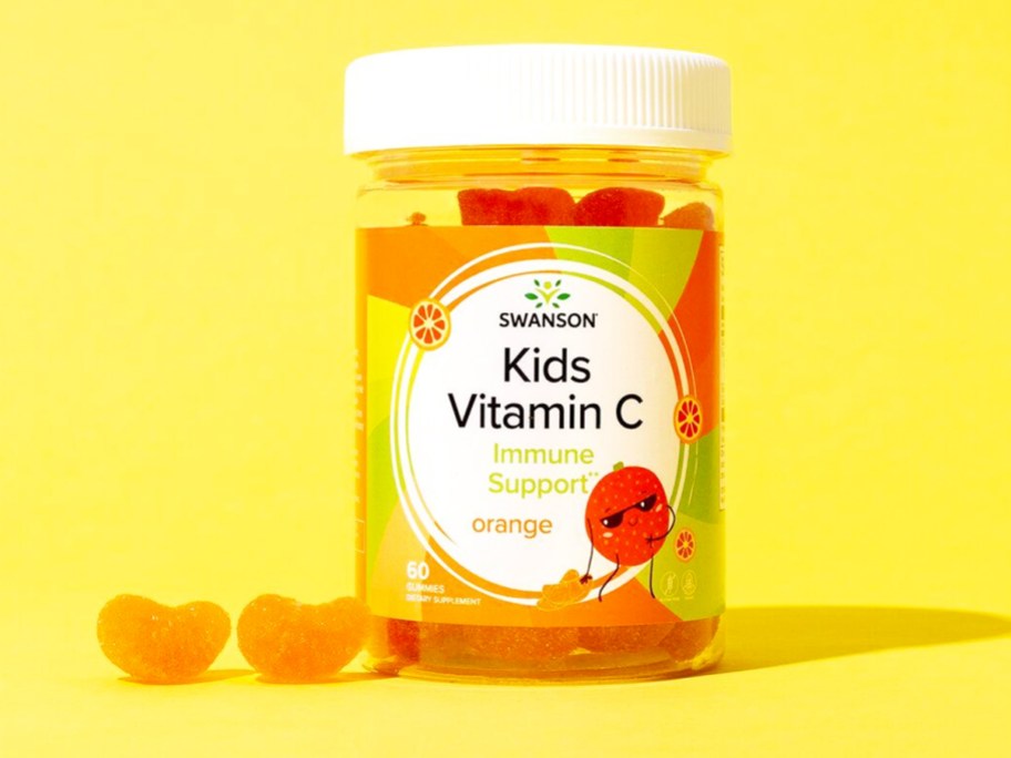 bottle of Swanson Premium Kids Vitamin C Gummies with yellow background