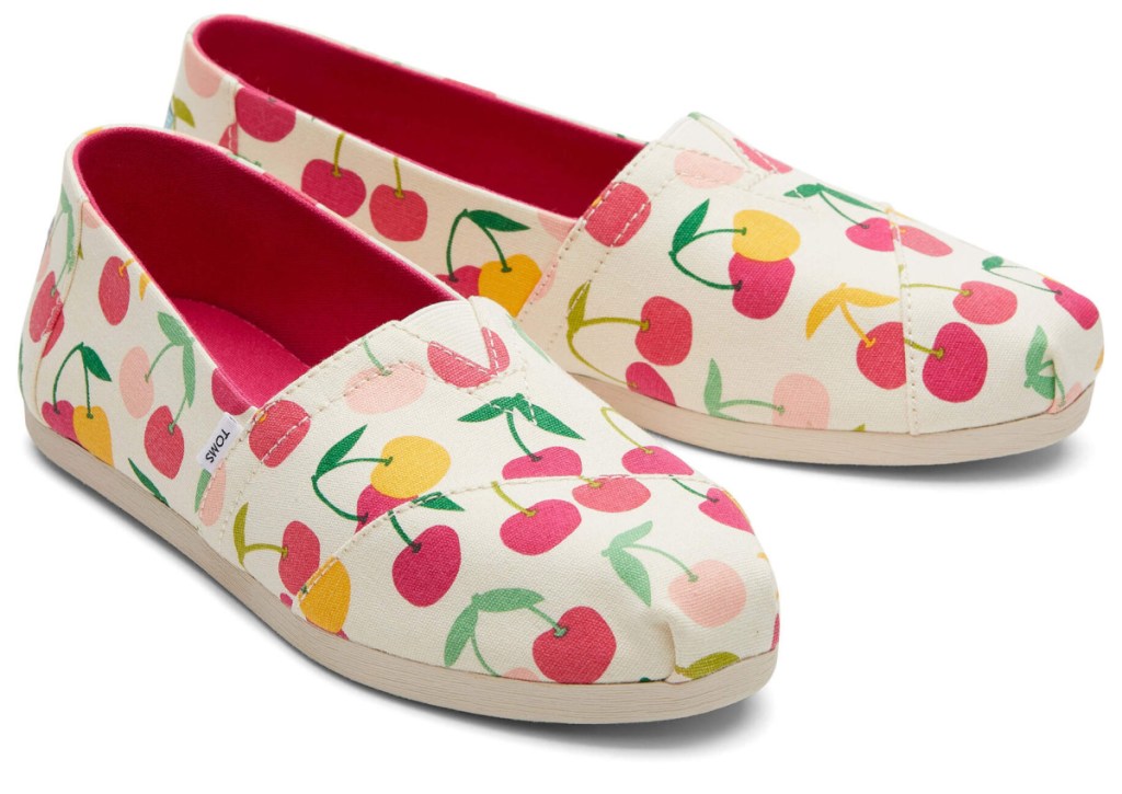 pair of toms shoes with cherry print