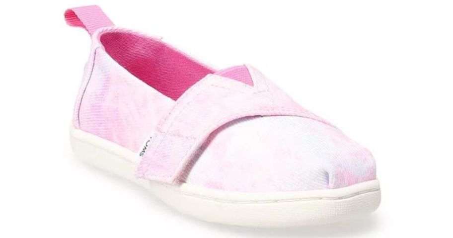 A pink TOMS toddler Alpargata Shoe