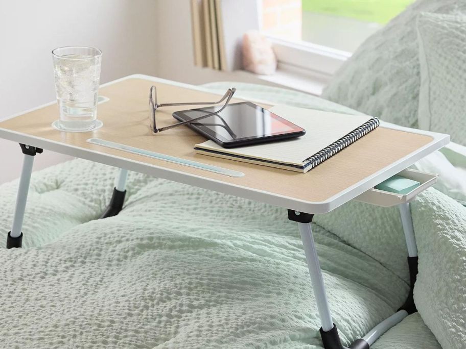 The Big One Collapsible Lap Desk on a bed