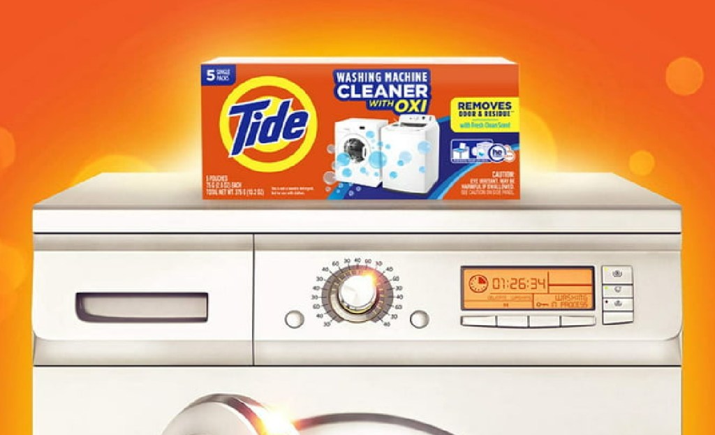 Tide + Oxi Powder Washing Machine Cleaner 3 Washer Pouches on top of a washing machine