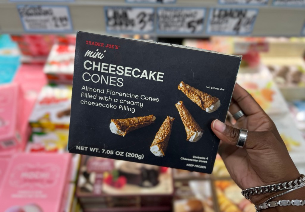 Hand holding Trader Joe's Cheesecake Cones which were newly released for fall 2023