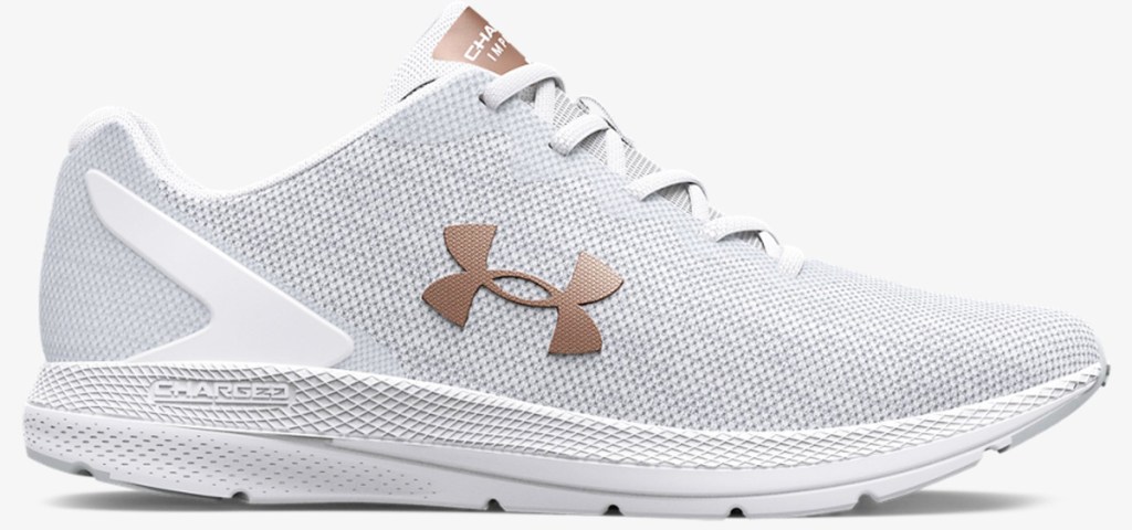 white running shoe with rose gold accents