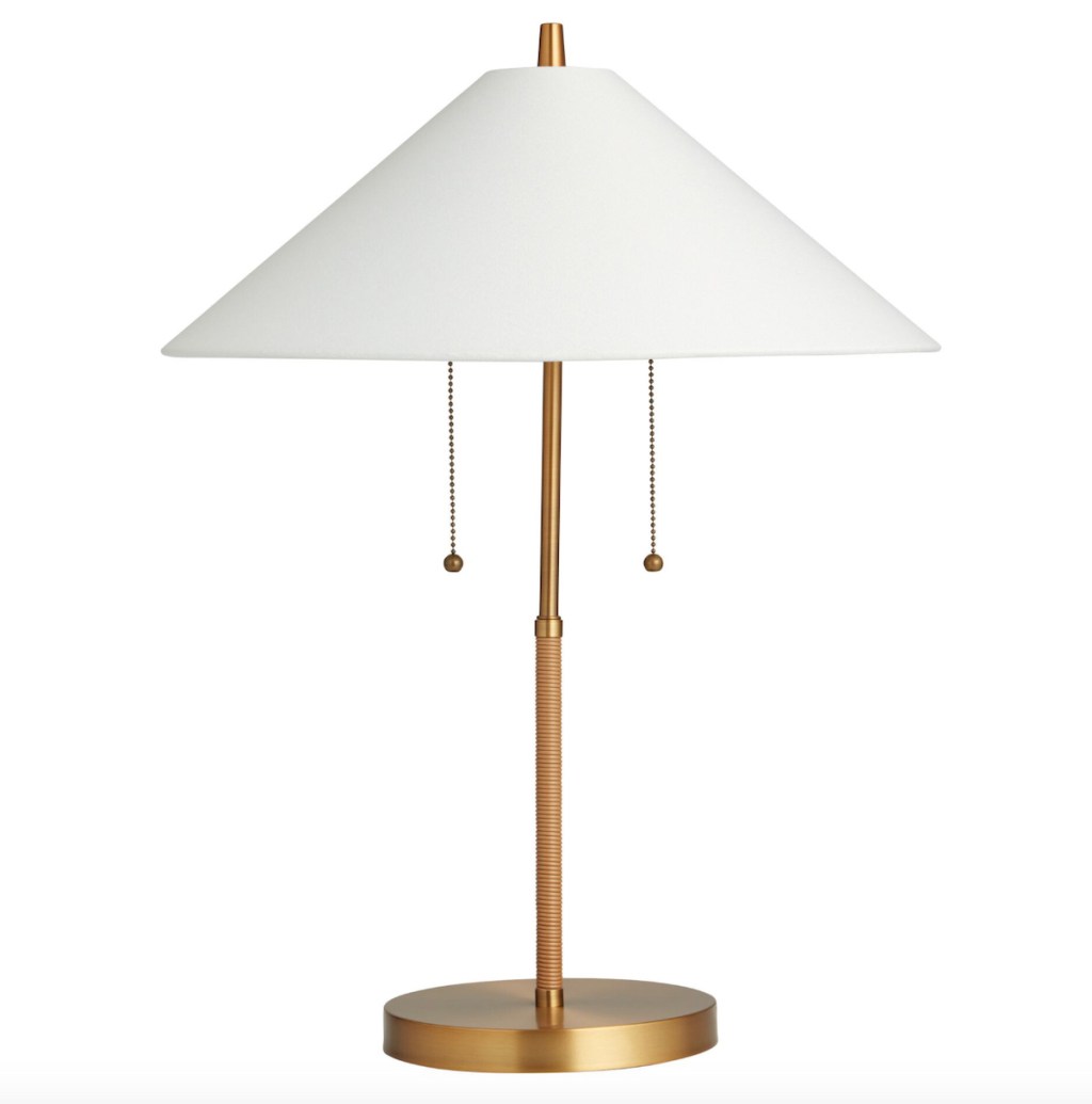 white and gold vintage lamp on white background