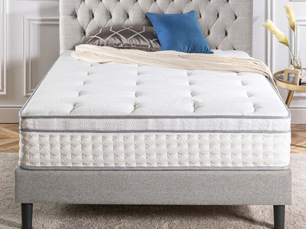 bed on a grey bed frame with matching headboard