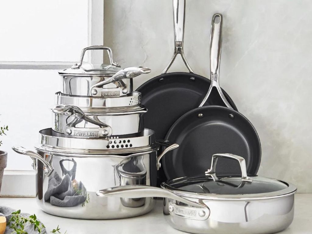 Stacked pots and pans with lids