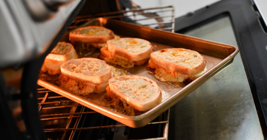 a sheet pan with grilled cheese sandwiches