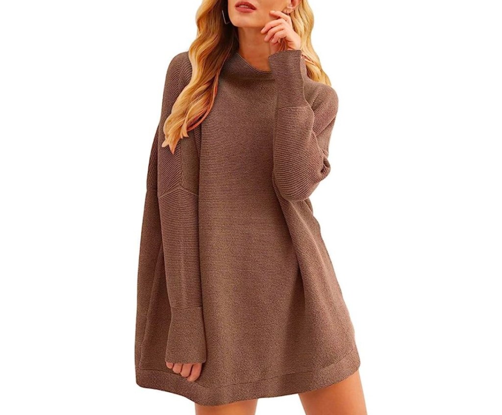 stock photo of woman posing in brown ribbed tunic sweater