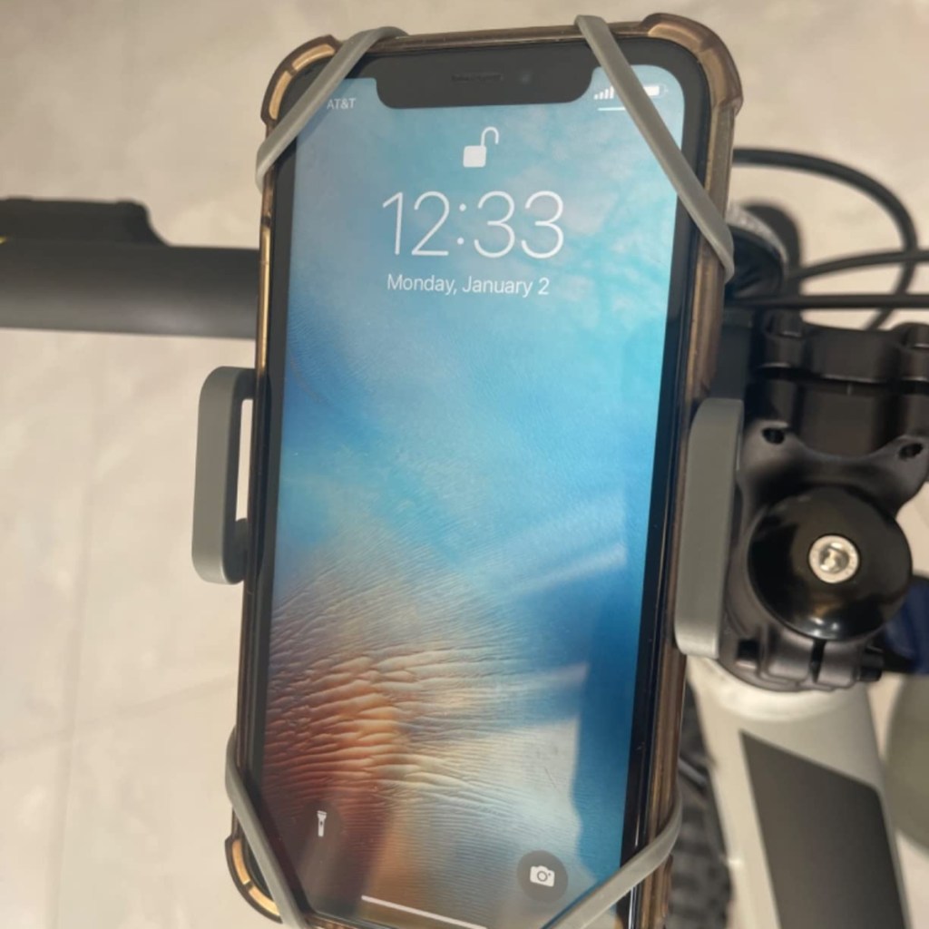 iphone mounted to bike handlebars