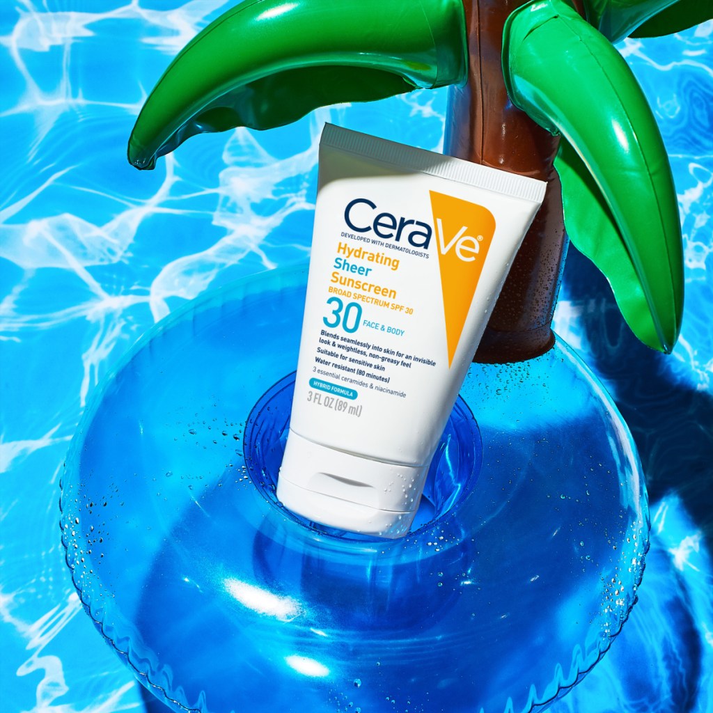 sunscreen bottle in pool floatie