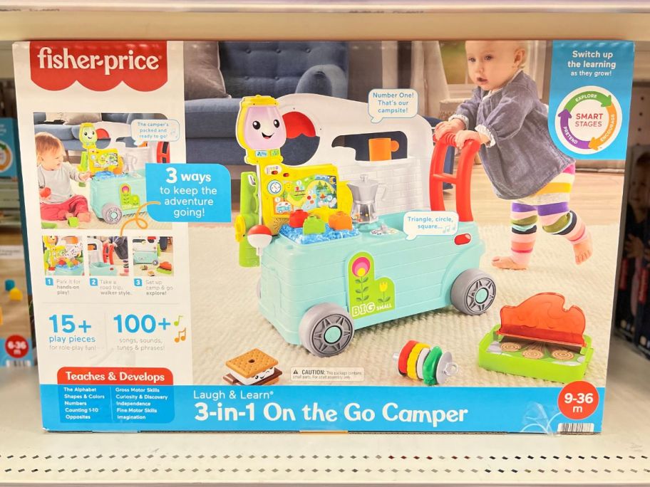 a toy camper in packaging on a store shelf