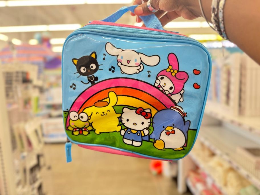 Hello Kitty And Friends Lunch Bag being held by hand in store