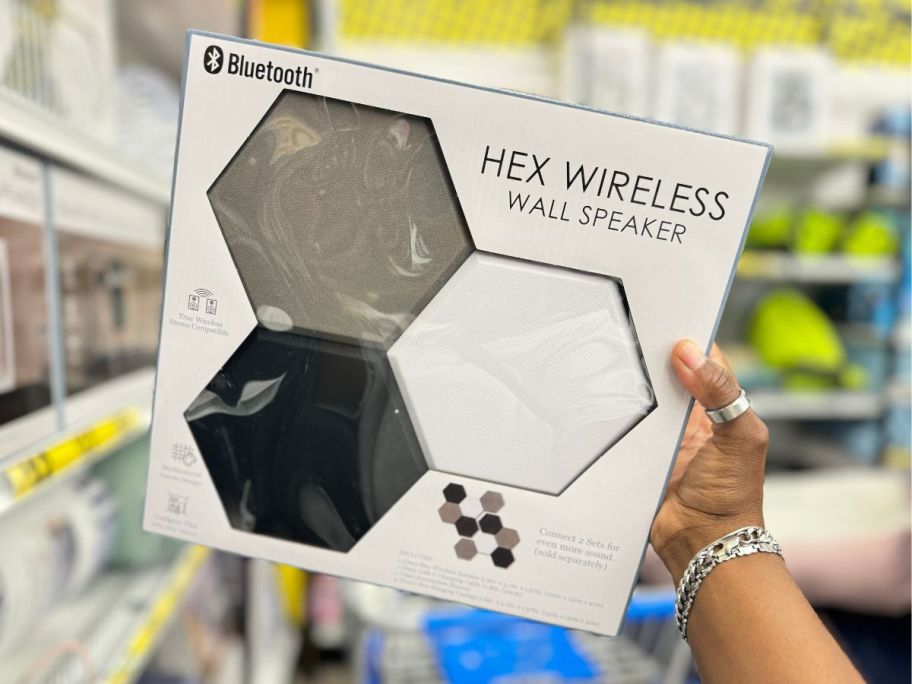 Hex Wireless Wall Art Speaker 5-Pack box being held by hand in store
