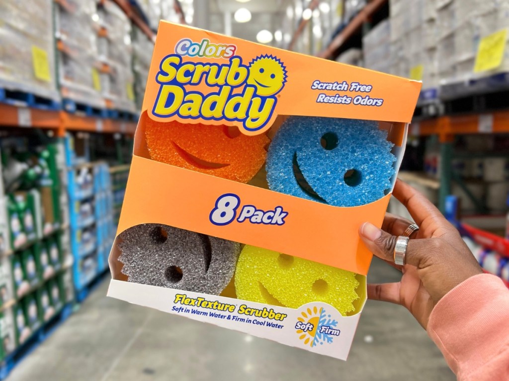 hand holding scrub daddy 8 pack