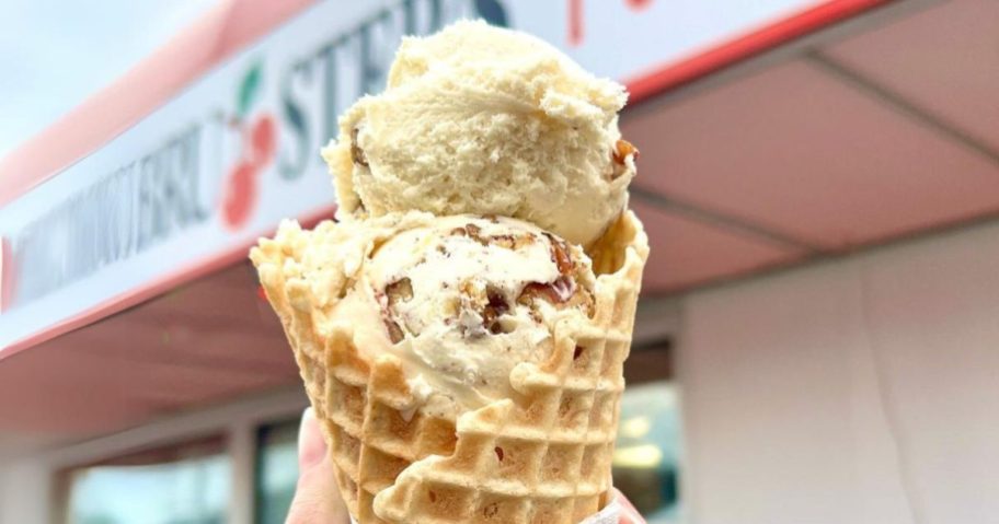 hand holding ice cream waffle cone