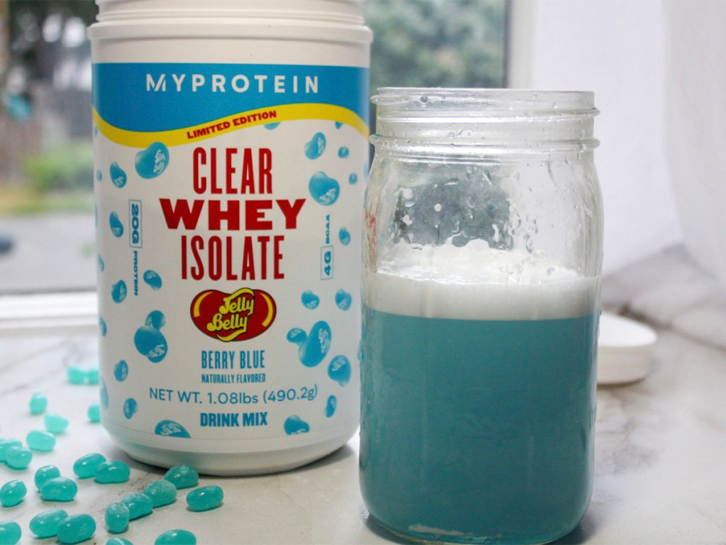 jelly bean berry whey protein powder with blue drink