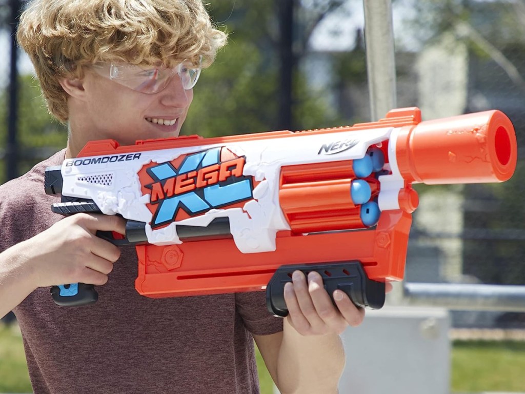 kid playing withNerf Mega XL Double Crusher Blaster