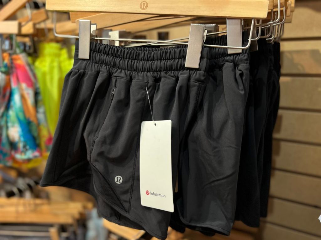 lululemon shorts hanging on a hanger at the store