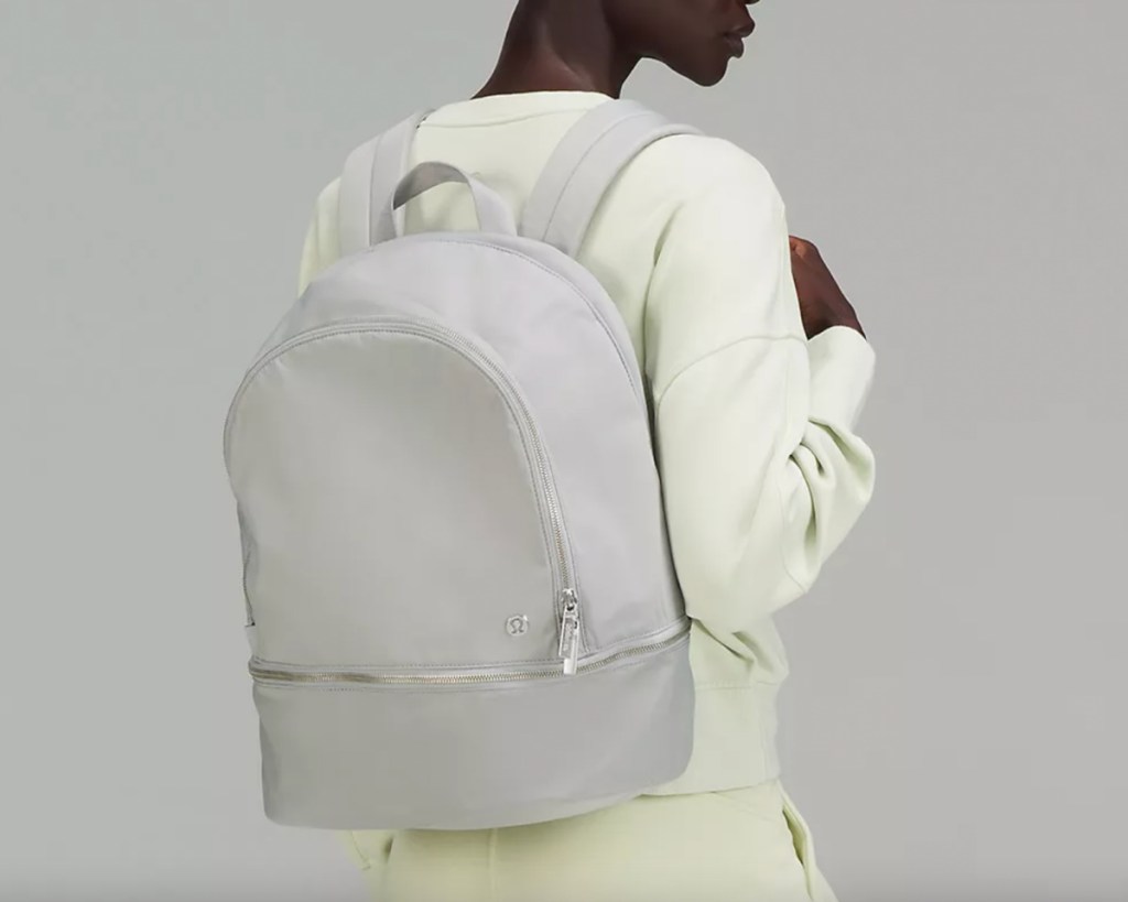 light grey backpack on back