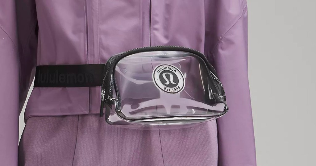 woman wearing clear lululemon bag across waist