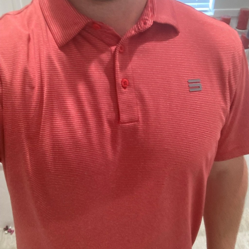 up close of red polo shirt