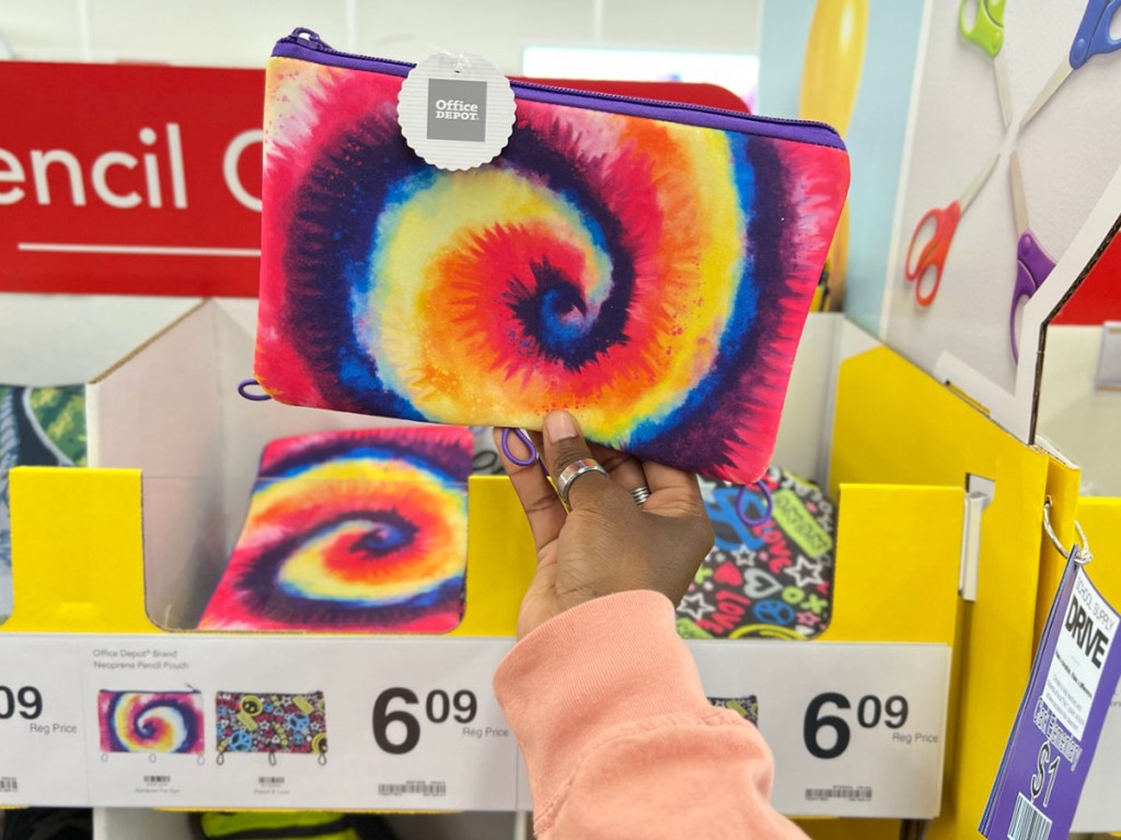 hand holding tie dye pencil pouch