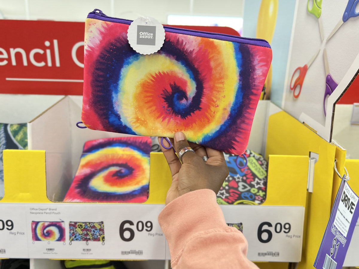 hand holding tie dye pencil pouch