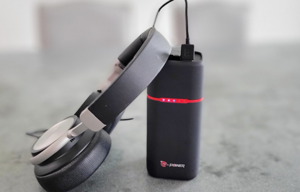 small portable charger with headset attached