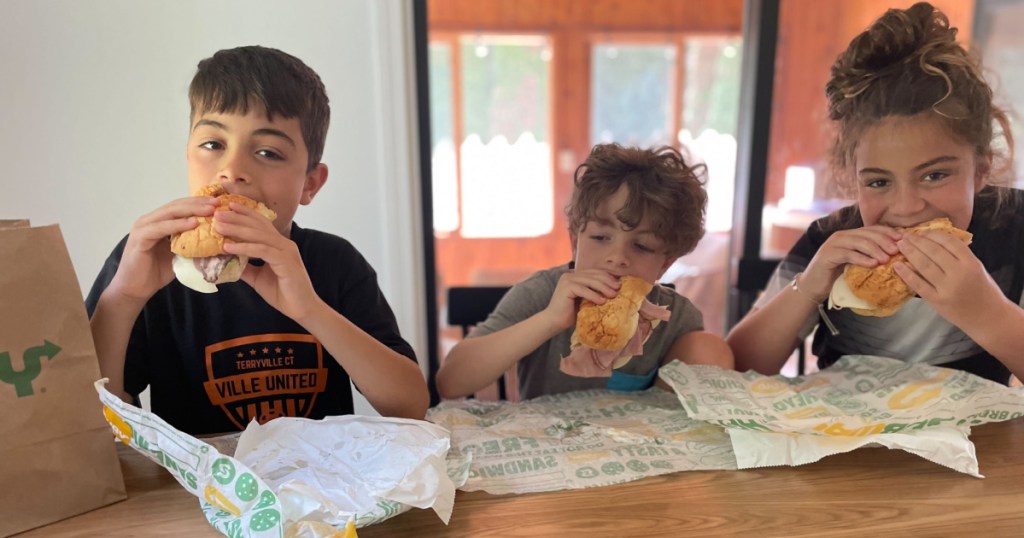 kids eating subway subs