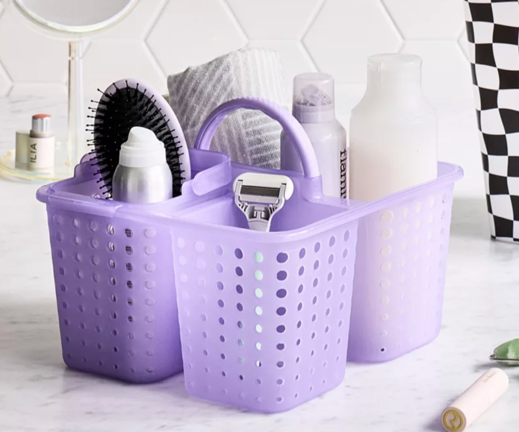 purple shower caddy with toiletries in it